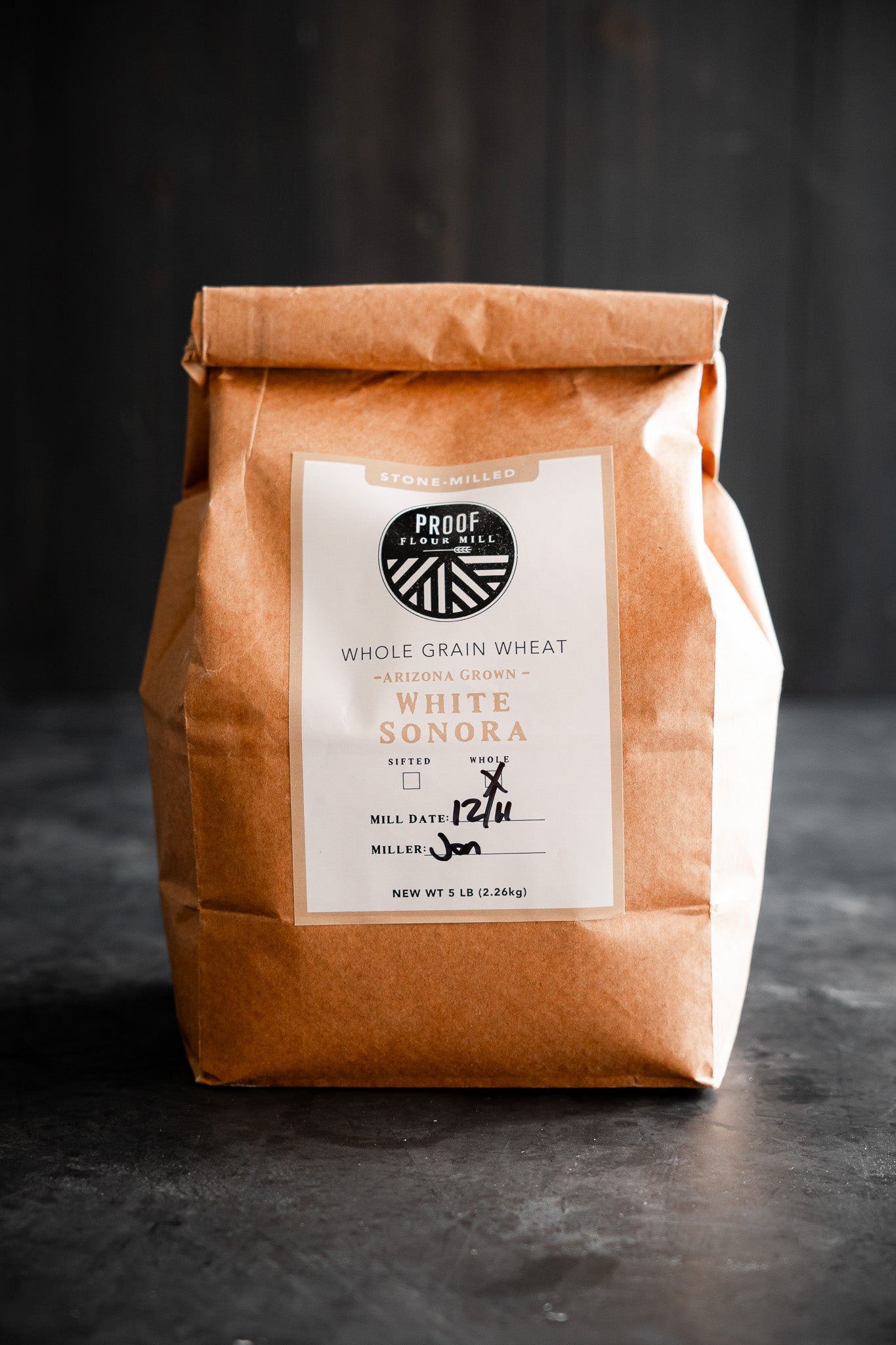 A bag of White Sonora flour grown in Arizona and freshly stone-milled by Proof Flour Mill of Proof Bread.
